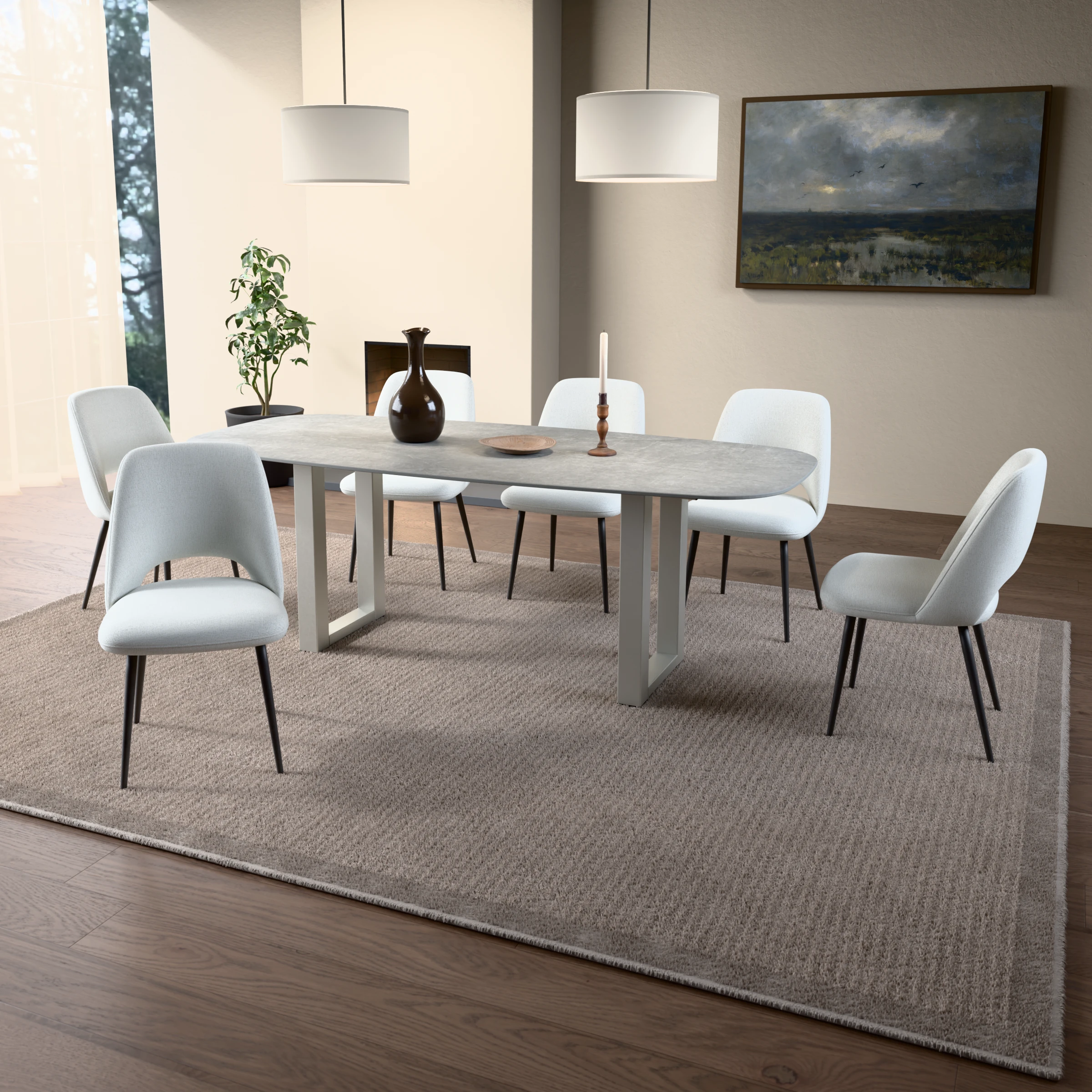 Danish-oval ceramic table Amsterdam stainless steel — in a room setting