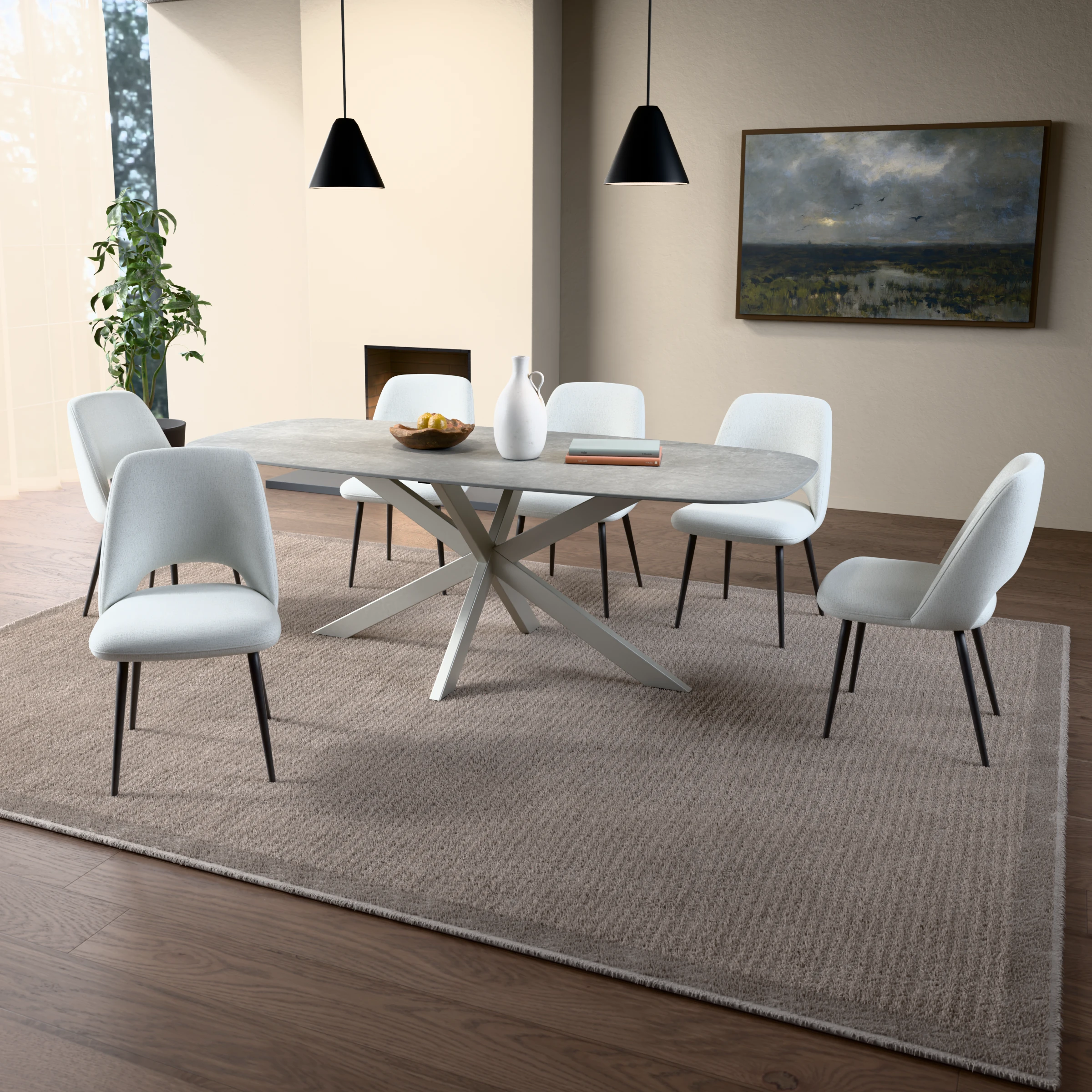Danish-oval ceramic table Riga 80x40 stainless steel — in a room setting
