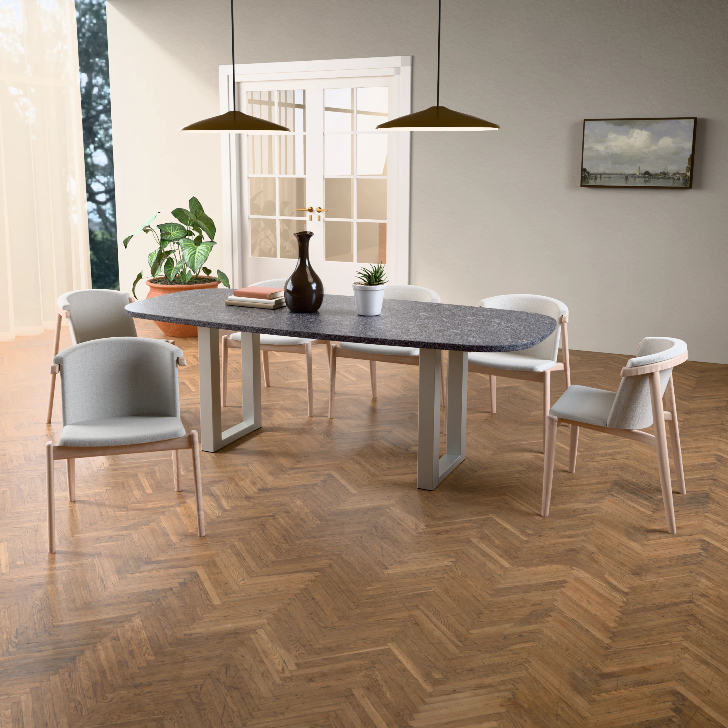 Danish-oval granite table Amsterdam stainless steel — in a room setting