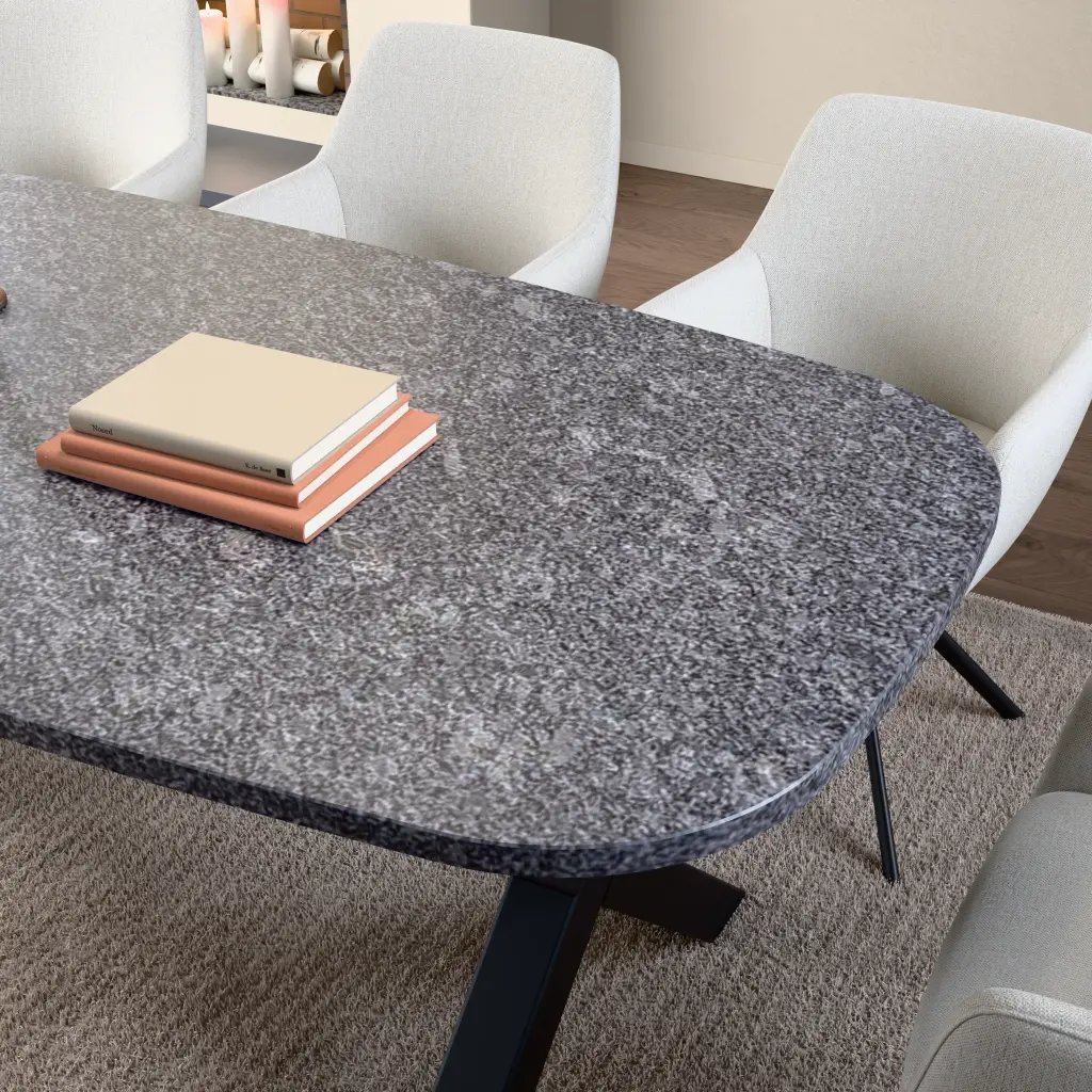 Graniet Steel Grey (Leather) table top. Surface and edge detail up close.