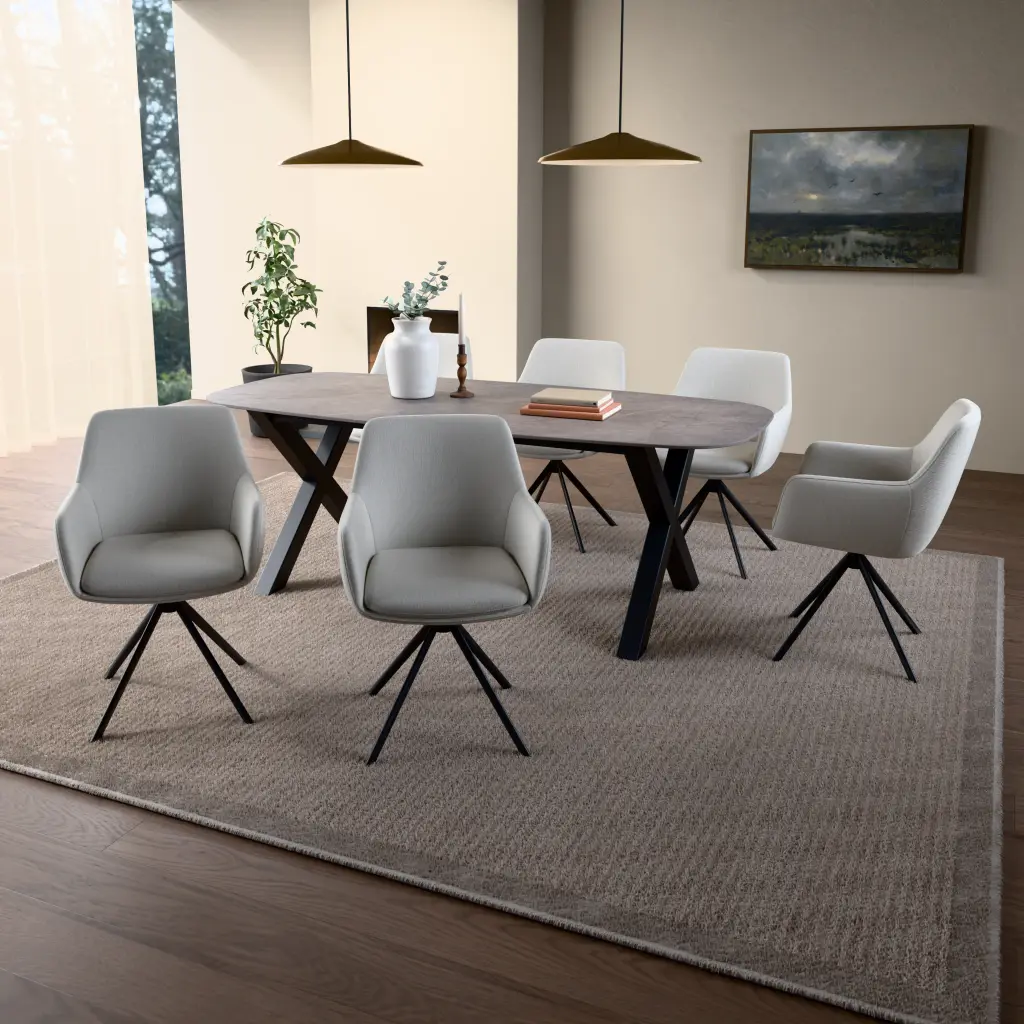 Ceramic table top Galaxy Stone Medium Grey. In a dining setting. Only the table top is included.